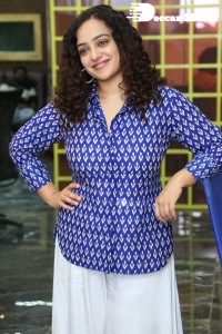 Actress Nithya Menen photoshoot in blue shirt and white trousers
