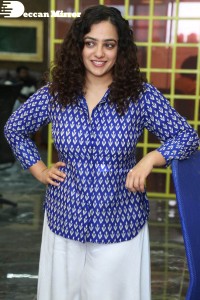 Actress Nithya Menen photoshoot in blue shirt and white trousers
