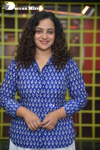 Actress Nithya Menen photoshoot in blue shirt and white trousers