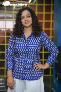 Actress Nithya Menen photoshoot in blue shirt and white trousers