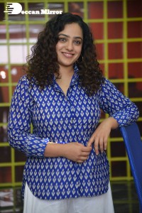 Actress Nithya Menen photoshoot in blue shirt and white trousers