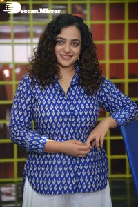 Actress Nithya Menen photoshoot in blue shirt and white trousers