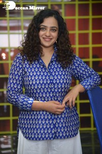 Actress Nithya Menen photoshoot in blue shirt and white trousers
