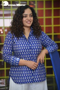 Actress Nithya Menen photoshoot in blue shirt and white trousers