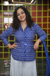 Actress Nithya Menen photoshoot in blue shirt and white trousers