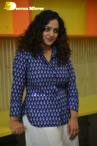 Actress Nithya Menen photoshoot in blue shirt and white trousers