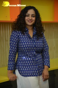 Actress Nithya Menen photoshoot in blue shirt and white trousers