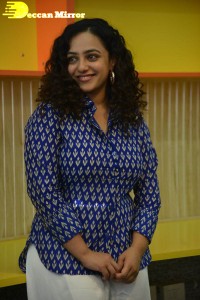 Actress Nithya Menen photoshoot in blue shirt and white trousers