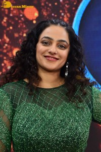 Nithya Menen in a green dress