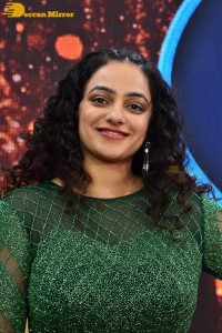 Nithya Menen in a green dress