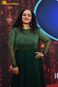 Nithya Menen in a green dress