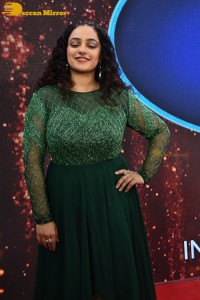 Nithya Menen in a green dress