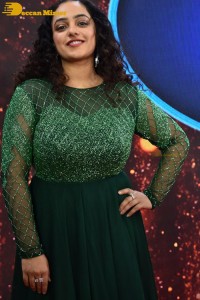 Nithya Menen in a green dress