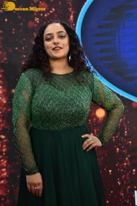 Nithya Menen in a green dress