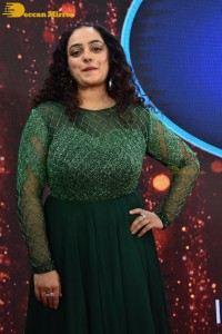 Nithya Menen in a green dress