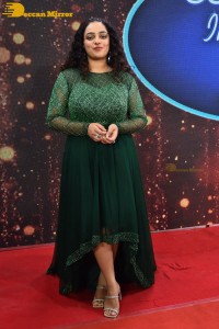 Nithya Menen in a green dress