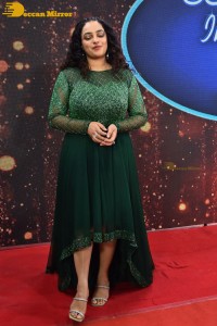 Nithya Menen in a green dress