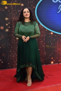 Nithya Menen in a green dress