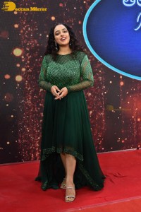 Nithya Menen in a green dress
