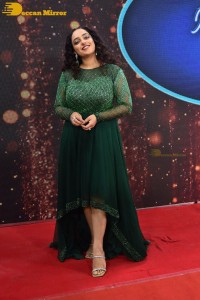 Nithya Menen in a green dress