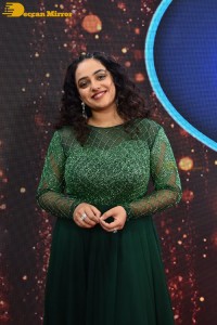 Nithya Menen in a green dress