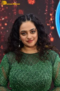 Nithya Menen in a green dress