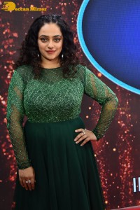 Nithya Menen in a green dress
