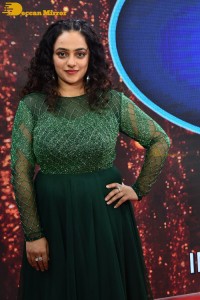 Nithya Menen in a green dress