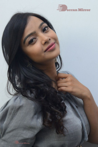 Telugu Actress Nithya Shetty in a grey dress