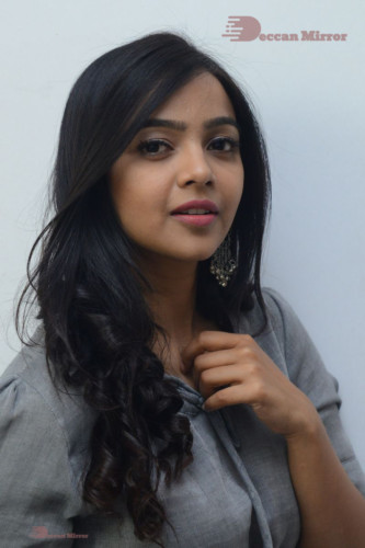 Telugu Actress Nithya Shetty in a grey dress