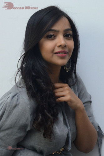 Telugu Actress Nithya Shetty in a grey dress