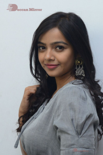 Telugu Actress Nithya Shetty in a grey dress