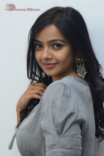 Telugu Actress Nithya Shetty in a grey dress