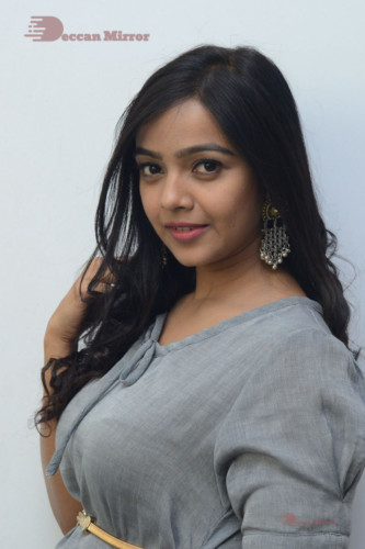 Telugu Actress Nithya Shetty in a grey dress