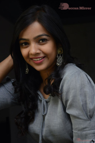 Telugu Actress Nithya Shetty in a grey dress