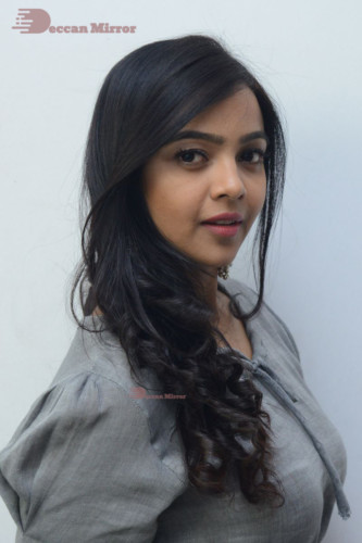 Telugu Actress Nithya Shetty in a grey dress