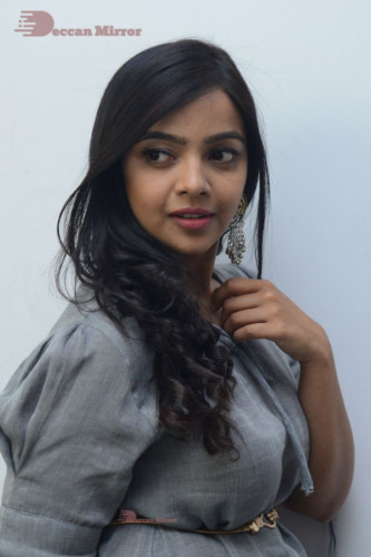 Telugu Actress Nithya Shetty in a grey dress