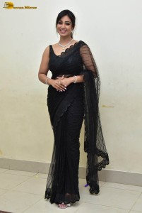 actress nivetha pethuraj sensuous looks in a black saree
