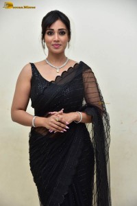actress nivetha pethuraj sensuous looks in a black saree