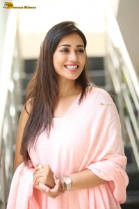 indian actress nivetha pethuraj in a pink salwar kameez dress