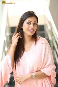 indian actress nivetha pethuraj in a pink salwar kameez dress