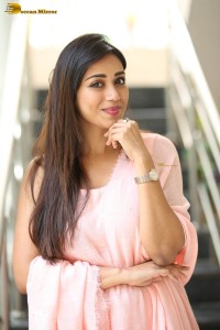 indian actress nivetha pethuraj in a pink salwar kameez dress