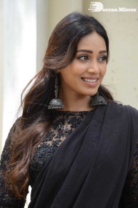 Actress Nivetha Pethuraj dressed in all black for a photoshoot