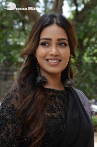 Actress Nivetha Pethuraj dressed in all black for a photoshoot
