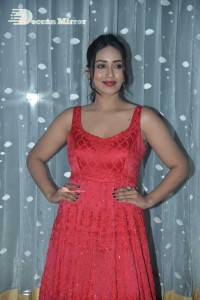 Actress Nivetha Pethuraj glamorous in a Red Dress attending the pre release function of movie Paagal