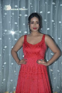 Actress Nivetha Pethuraj glamorous in a Red Dress attending the pre release function of movie Paagal
