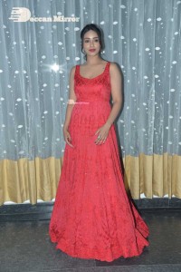 Actress Nivetha Pethuraj glamorous in a Red Dress attending the pre release function of movie Paagal