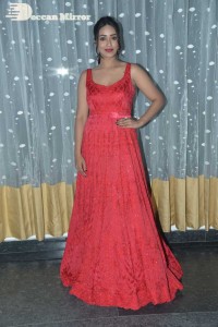 Actress Nivetha Pethuraj glamorous in a Red Dress attending the pre release function of movie Paagal