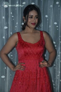 Actress Nivetha Pethuraj glamorous in a Red Dress attending the pre release function of movie Paagal