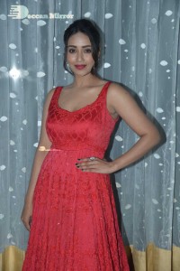 Actress Nivetha Pethuraj glamorous in a Red Dress attending the pre release function of movie Paagal